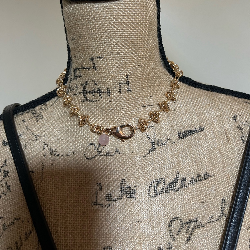 Jane Win in a knot chain with rose quartz